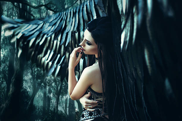 istock Black Angel. Pretty girl-demon 577319026