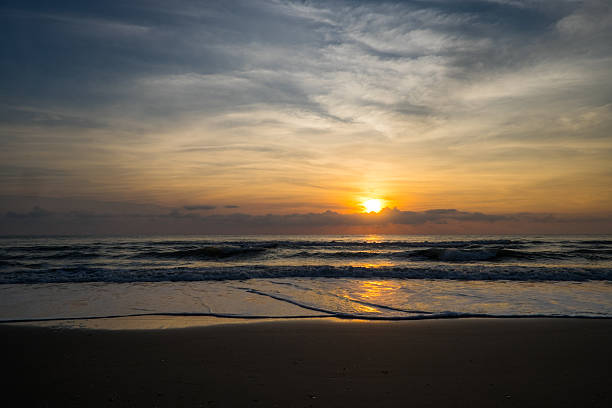 istock Beautiful sunrise on the beach. 577319224