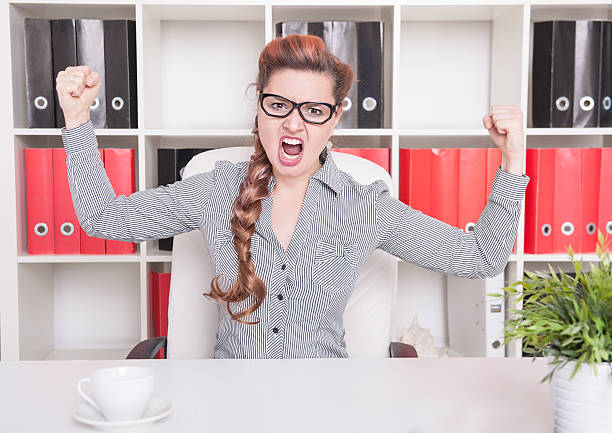 istock Angry business woman boss screaming 577320454