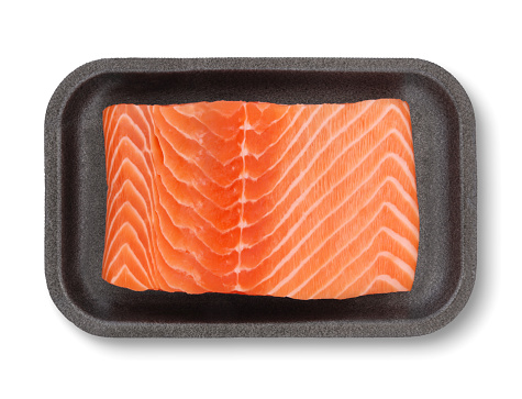 Salmon Fillet in Black Styrofoam Package isolated on white (excluding the shadow)