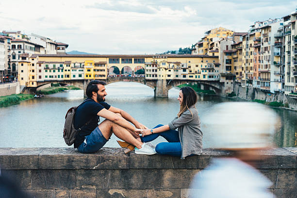 istock Couple in love near Ponte Vecchio bridge in Florence 577320808