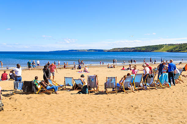 people enjoying scarborough beach - family child crowd british culture imagens e fotografias de stock