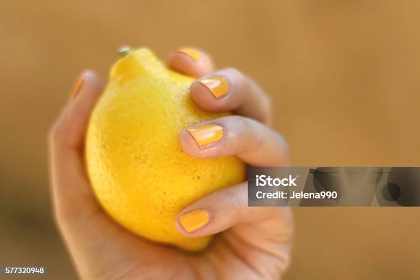 Lemon Stock Photo - Download Image Now - Cool Attitude, Nail Polish, Lemon - Fruit
