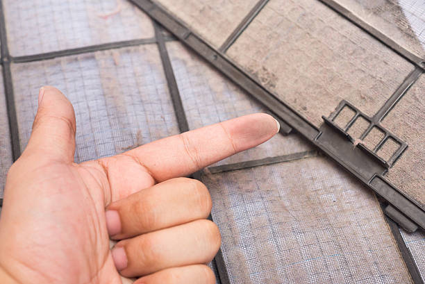 dirty air conditioner filter and dirty finger