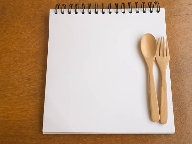 istock Wooden utensils on the white paper 577326508