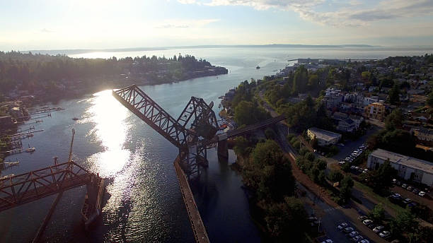 Aerial View Salmon Bay Bridge Ballard, Seattle, Washington Aerial View Sun Reflection Near Salmon Bay Bridge Ballard, Seattle, Washington ballard-seattle stock pictures, royalty-free photos & images
