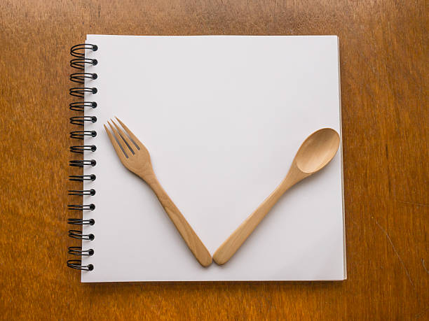 istock Wooden utensils on the white paper 577326676