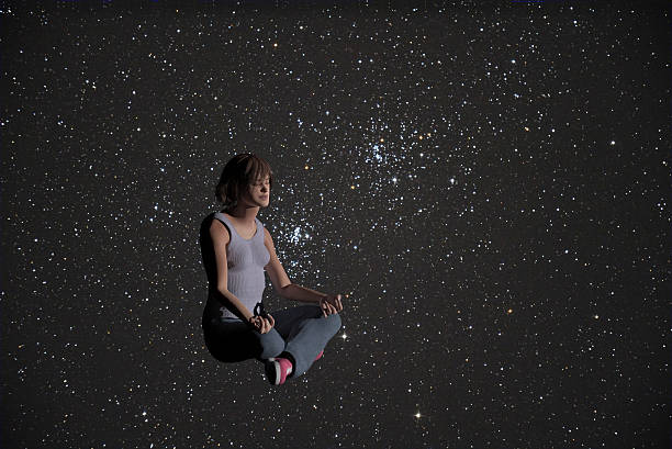 yoga in the stars stock photo