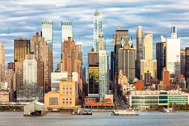 midtown manhattan al crepuscolo, new york city - waterfront property foto e immagini stock