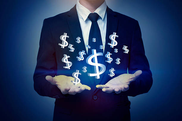 istock Businessman hand holding money, business concept 577329498