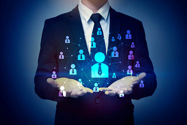 istock Businessman hand holding people connection, business concept 577329802