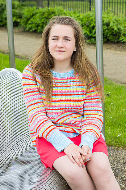 istock Beautiful girl in summer park 577330176