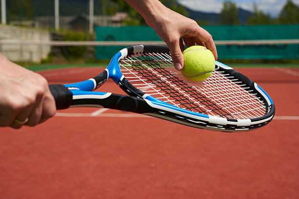 istock play tennis outdoors 577330622