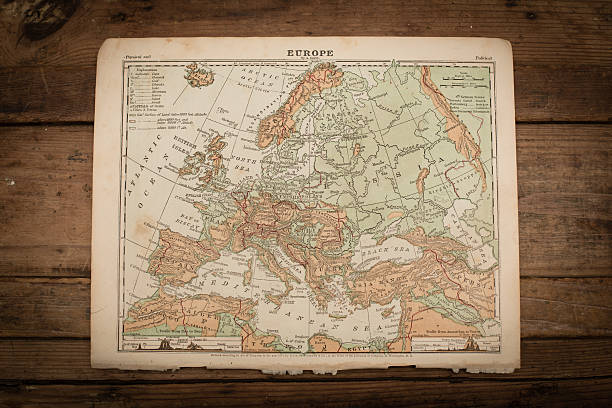 Europe Map Illustration, Antique 1871 Book Page Color stock photo of an antique Europe map illustration page on an old, wooden trunk. Salvaged from an 1871 geography book. topographic map photos stock pictures, royalty-free photos & images