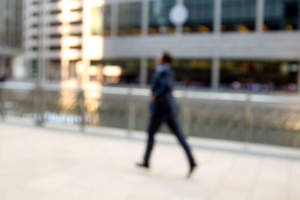 istock people in bokeh, street of downtown 577331206