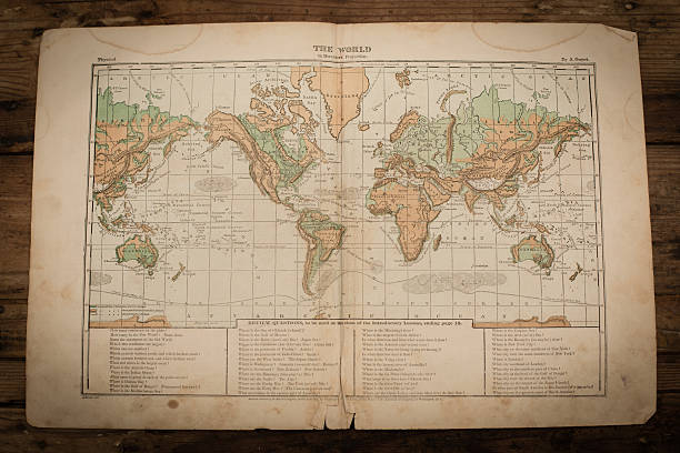 World Map Illustration, Antique 1871 Book Page Color stock photo of an antique world map illustration page on an old, wooden trunk. Salvaged from an 1871 geography book. topographic map photos stock pictures, royalty-free photos & images