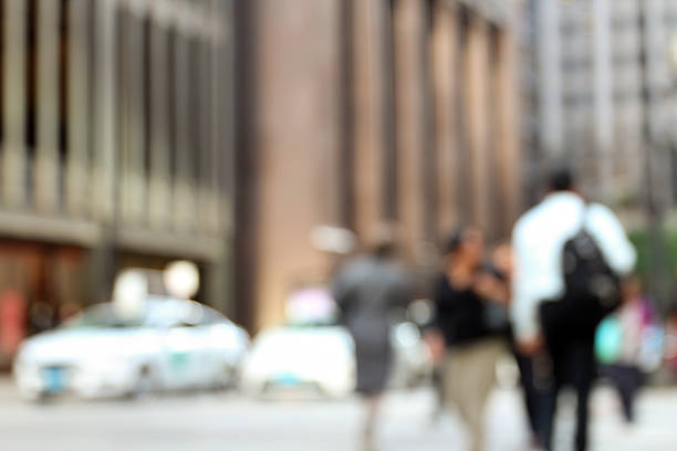 istock people in bokeh, street of downtown 577331408