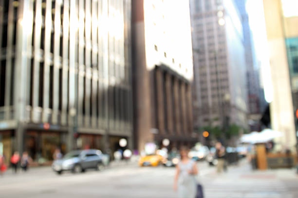 istock people in bokeh, street of downtown 577331500