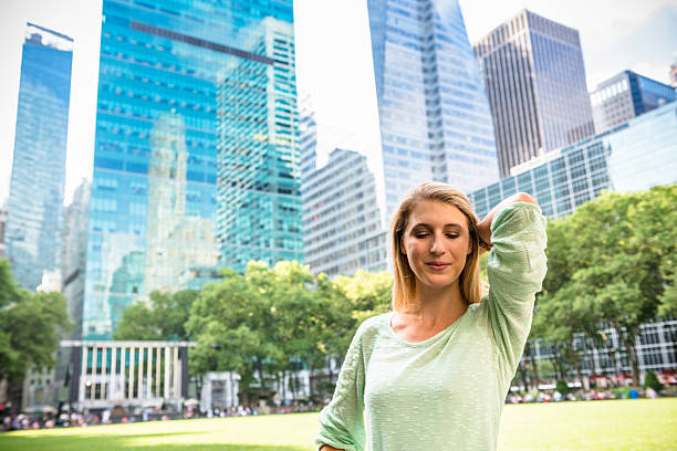istock Freedom woman on NYC in bryant park 577332080