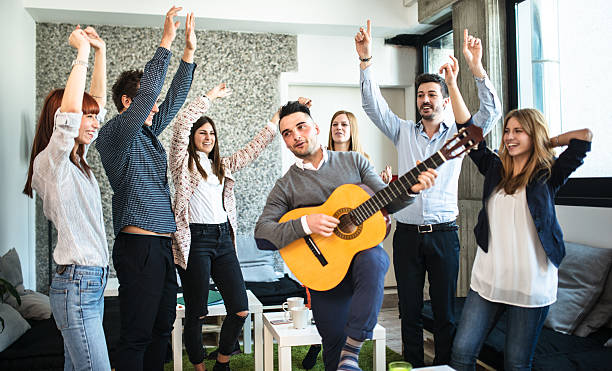 istock friends togetherness have a party in the office 577335340