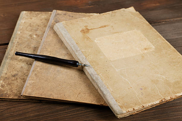 istock Still-life with old writing-books a nib 577336080