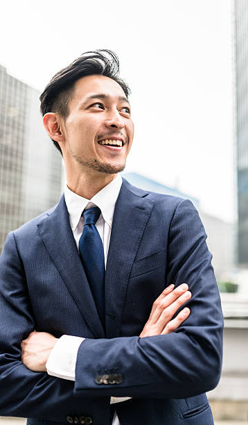 istock Business japanese standing with arm crossed 577336832