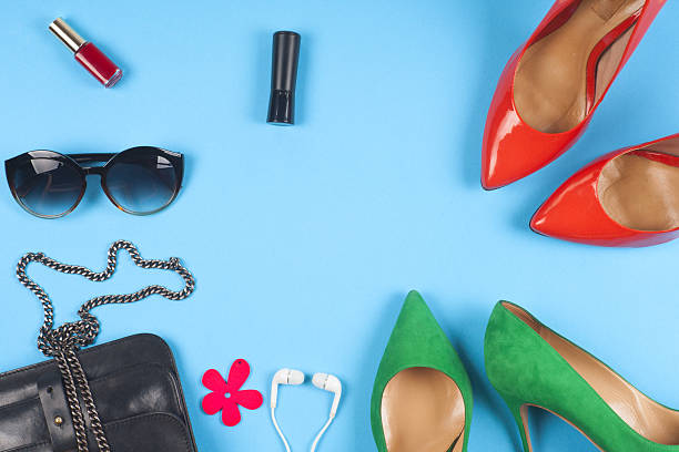 istock Women clothing set and accessories on light background. 577337432