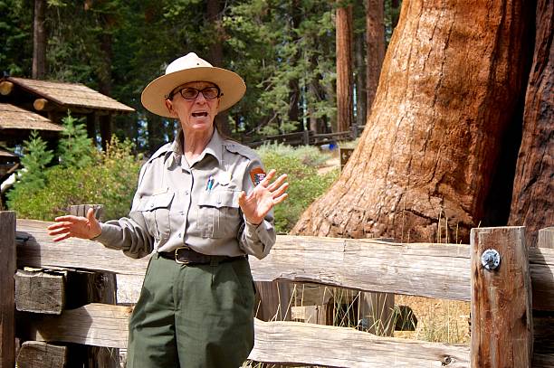 Ranger Gives Talk - Sequoia NP Three Rivers, California – September 14, 2014: A park ranger gives a nature talk near the Giant Forest Museum at Sequoia National Park. park ranger stock pictures, royalty-free photos & images