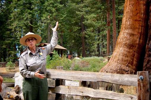 Three Rivers, California – September 14, 2014: A park ranger gives a nature talk near the Giant Forest Museum at Sequoia National Park.