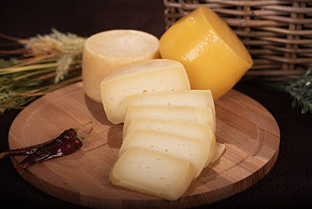 istock Various cheeses on the wooden board 577339290