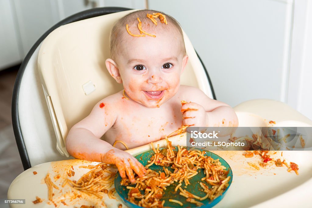 Little B Little B Eating Her Dinner And Making A Mess Stock Photo - Download ...