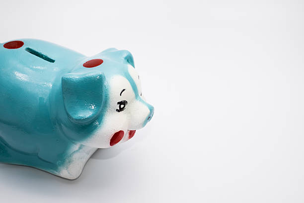 istock blue piggy bank  on whit background 577347188