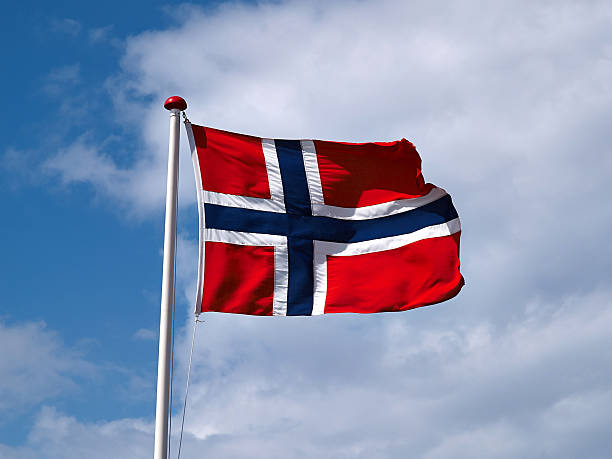 Waiving flag of Norway stock photo