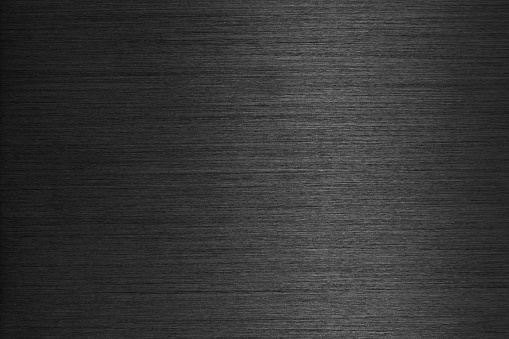 Black metal texture brushed. Abstract background.