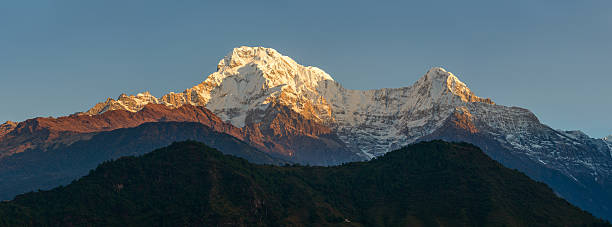 istock Annapurnas at sunrise panoramic view, Nepal 577618550