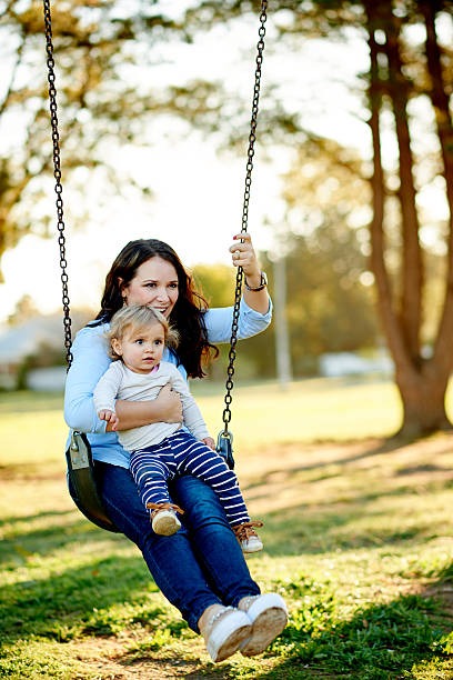 istock Swinging in the sunshine 577619746