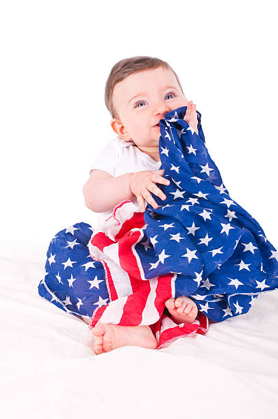 istock Baby girl with american flag. 577620262