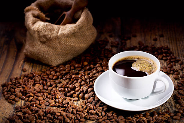 istock cup of coffee with beans 577621460