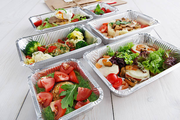 istock Healthy food in boxes, diet concept. 577624876