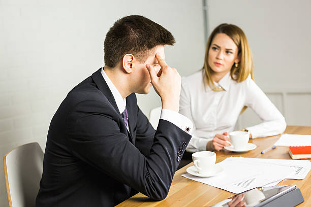 istock business couple working together on project at modern startup office 577625880