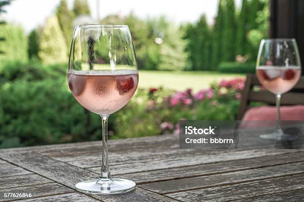 Wine Glasses On Table At Garden Stock Photo - Download Image Now - Wine, Springtime, Summer