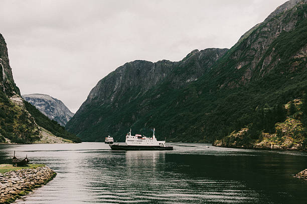 istock Ferry on the fjord 577627350