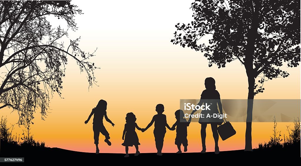 Afternoon Daycare Walk A vector silhouette illustration of a group of four young children accompanied by a yougn woman walking along a path in a park. There are trees to either side and the sky in the background is an orange gradient. In Silhouette stock vector