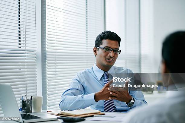 Consulting Coworker Stock Photo - Download Image Now - Culture of India, Businessman, Discussion