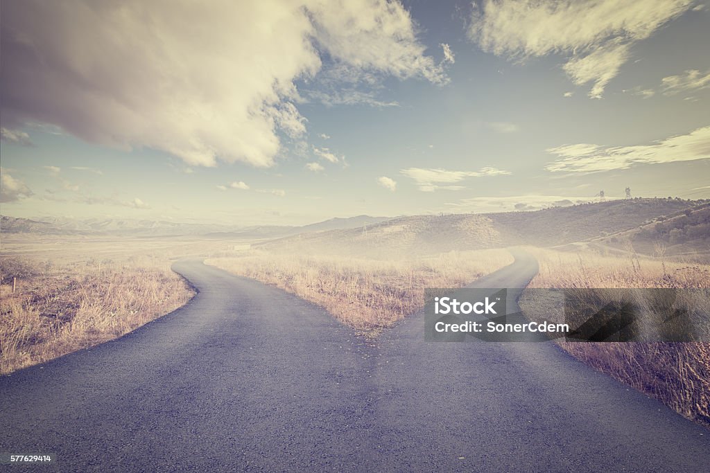 Concept of choice with crossroads spliting in two ways Crossroad Stock Photo