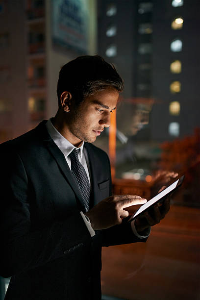 istock Technology allows him to stay connected no matter the hour 577630776