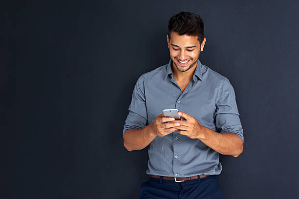 istock Staying informed with all his business connections 577633718
