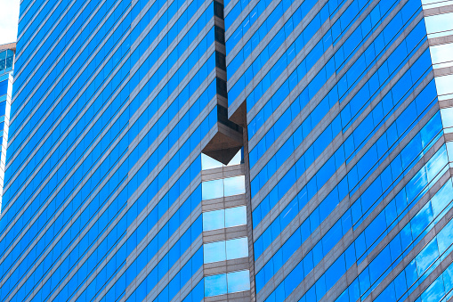 Modern skyscaper close up to window
