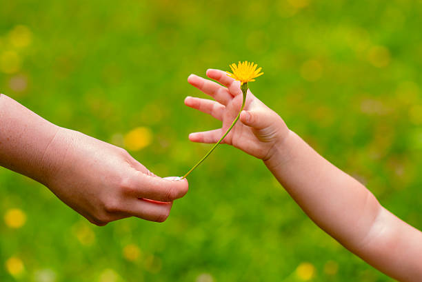 istock mom and daughter having fun in summer day 577638348