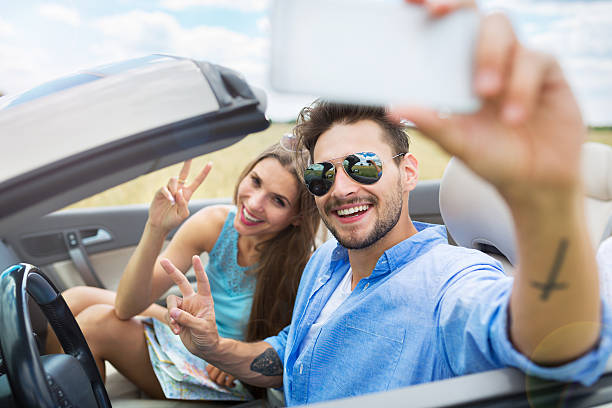 istock Couple taking a selfie while out on a road trip 577638752